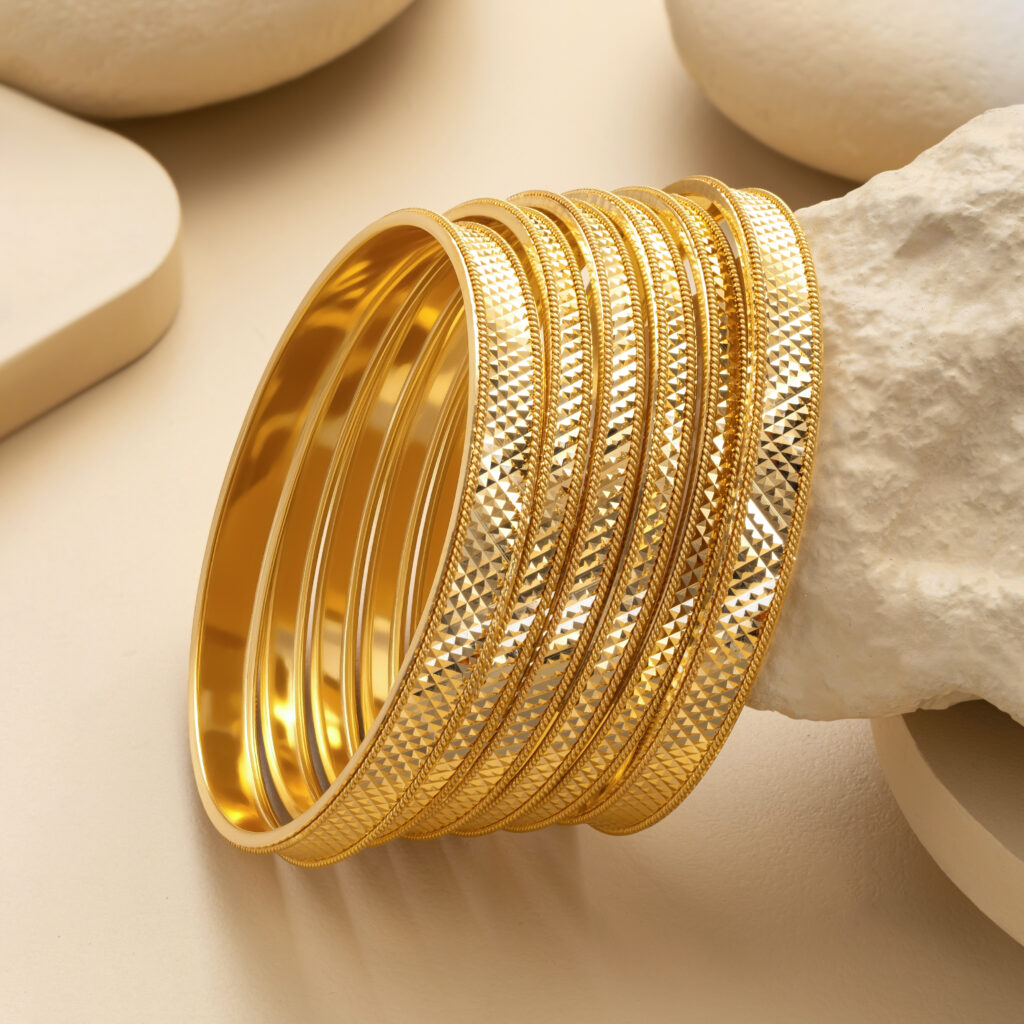 Fine gold bangle set by Hibaat