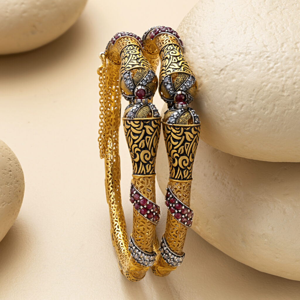 Fine gold bangle set by Hibaat