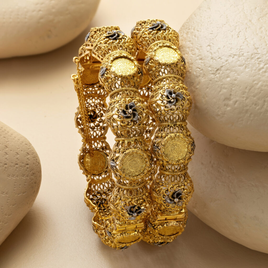 Fine gold bangle set by Hibaat