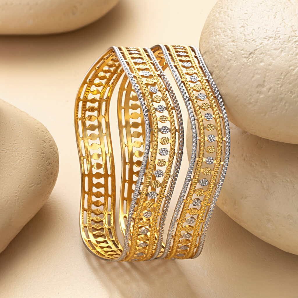 Fine gold bangle set by Hibaat