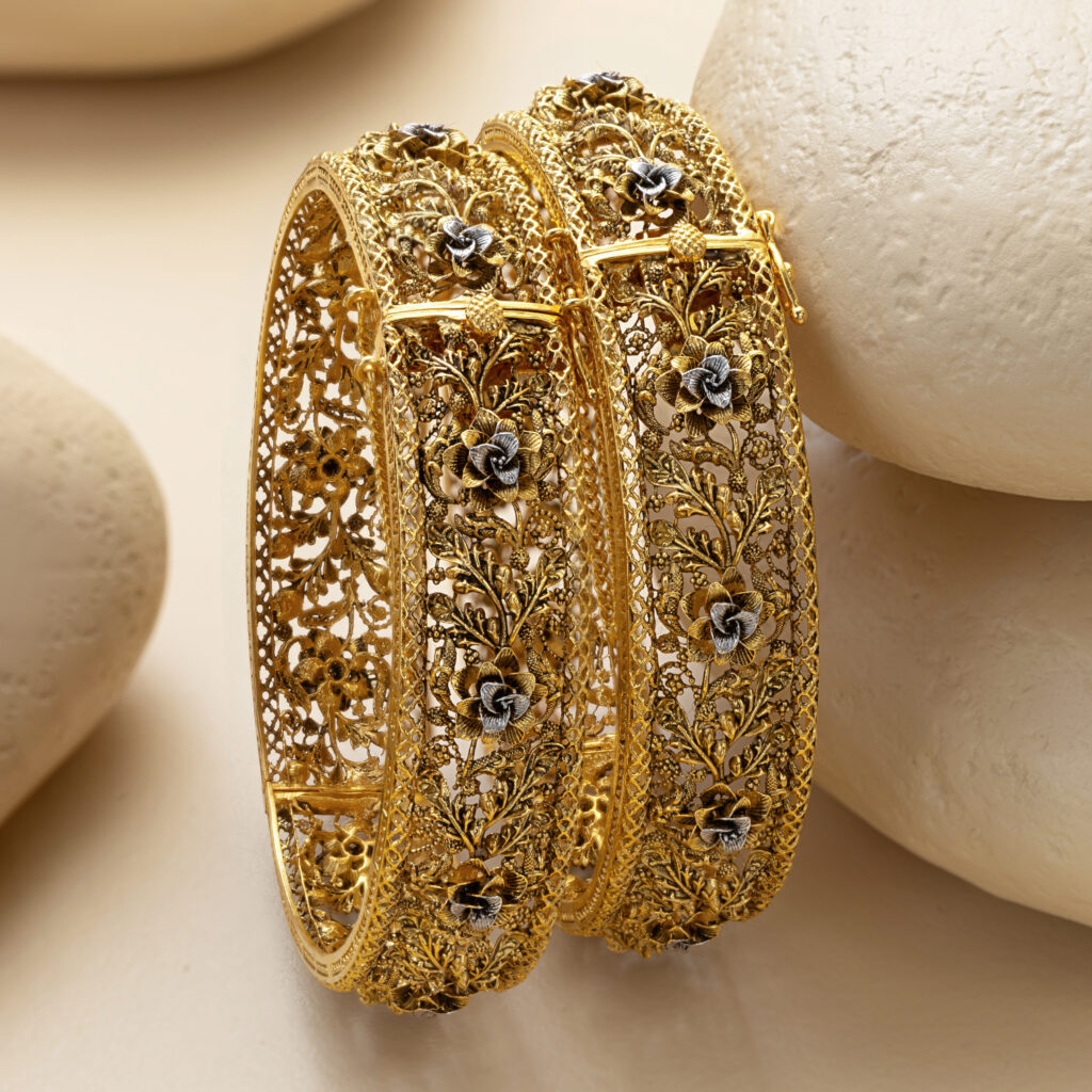 Fine gold bangle set by Hibaat