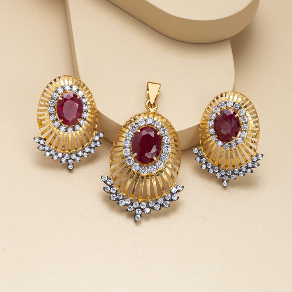 Fine gold ruby pendant set by Hibaat
