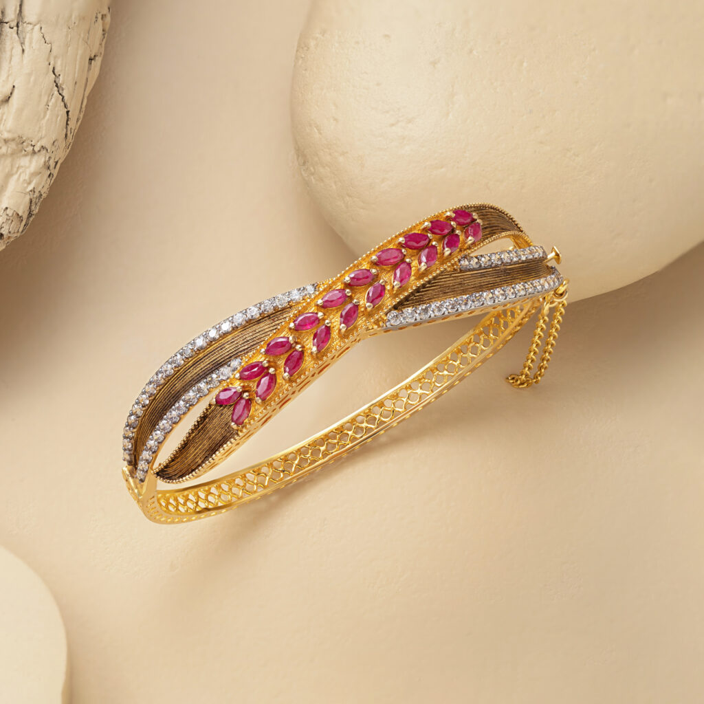 Fine gold ruby bangle by Hibaat