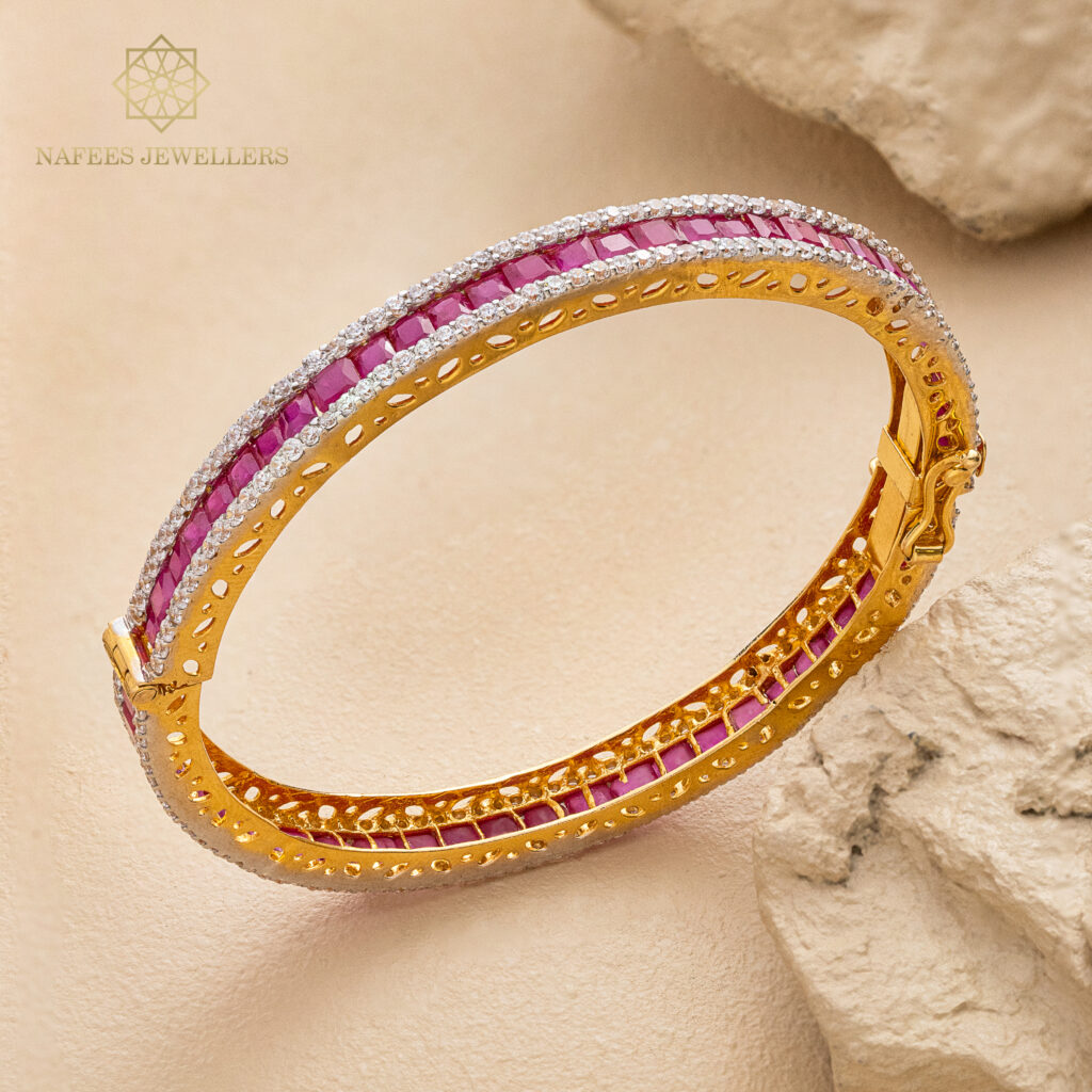 Fine gold ruby bangle by Hibaat
