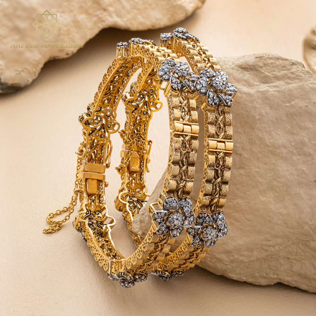 Fine gold bangle set by Hibaat