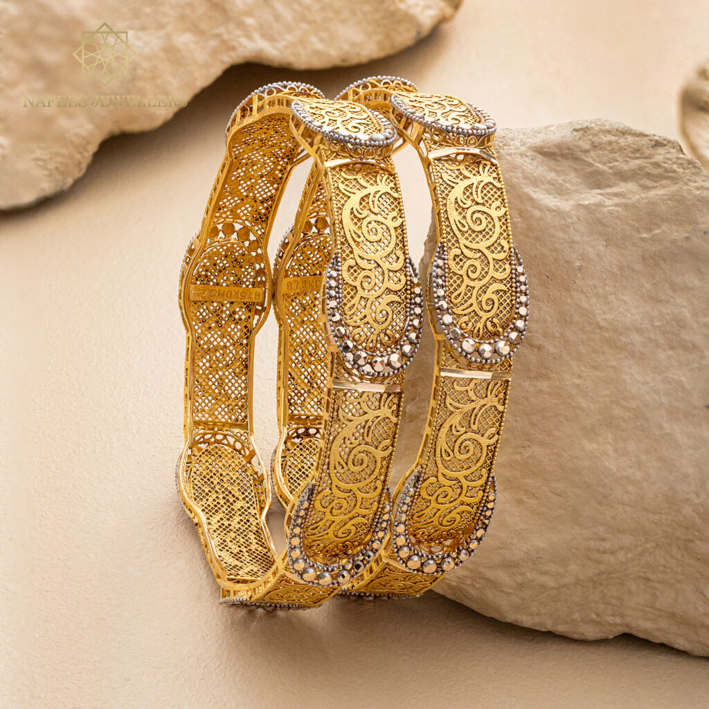 Fine gold bangle set by Hibaat