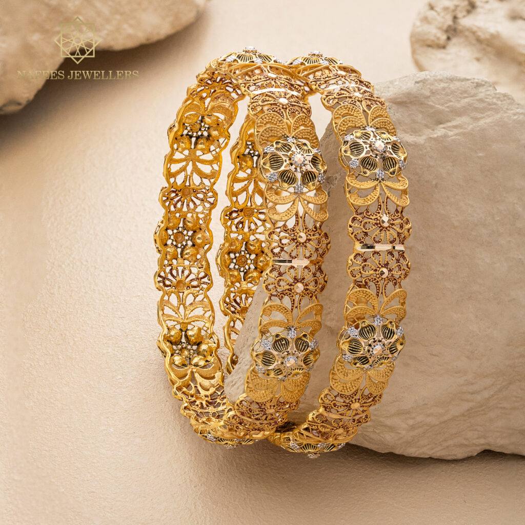 Fine gold bangle set by Hibaat