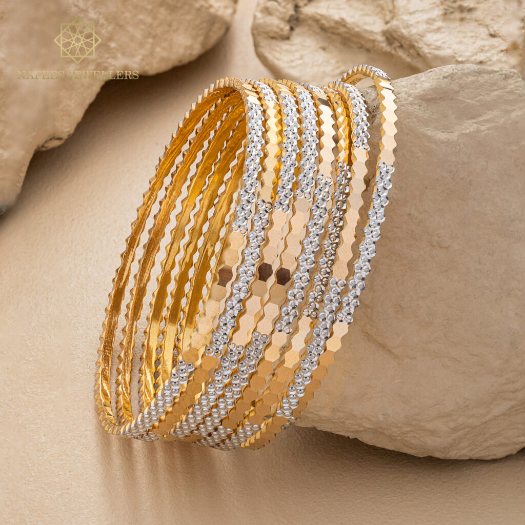 Fine gold bangle set by Hibaat
