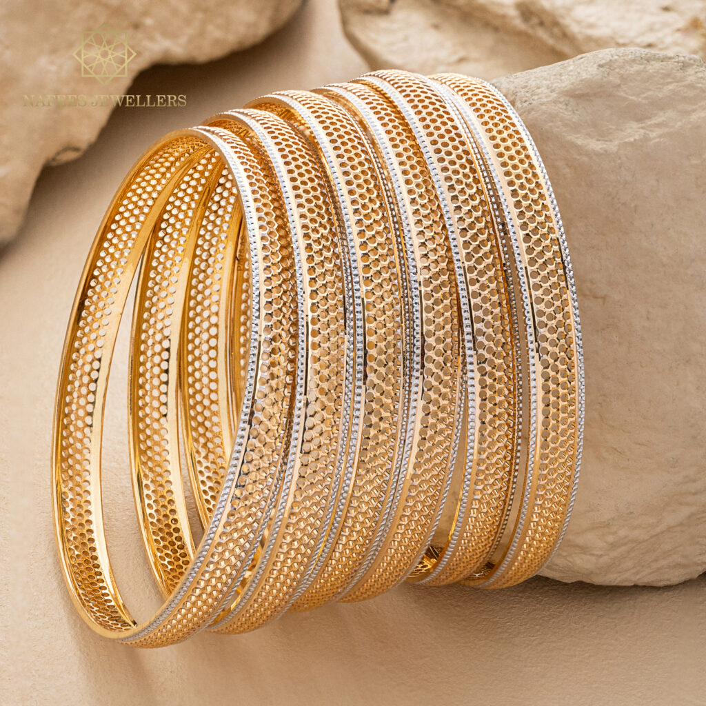 Fine gold bangle set by Hibaat