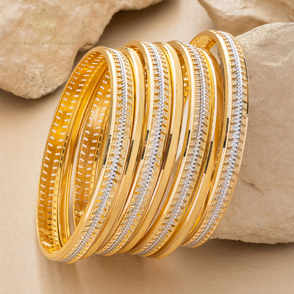 Fine gold bangle set by Hibaat