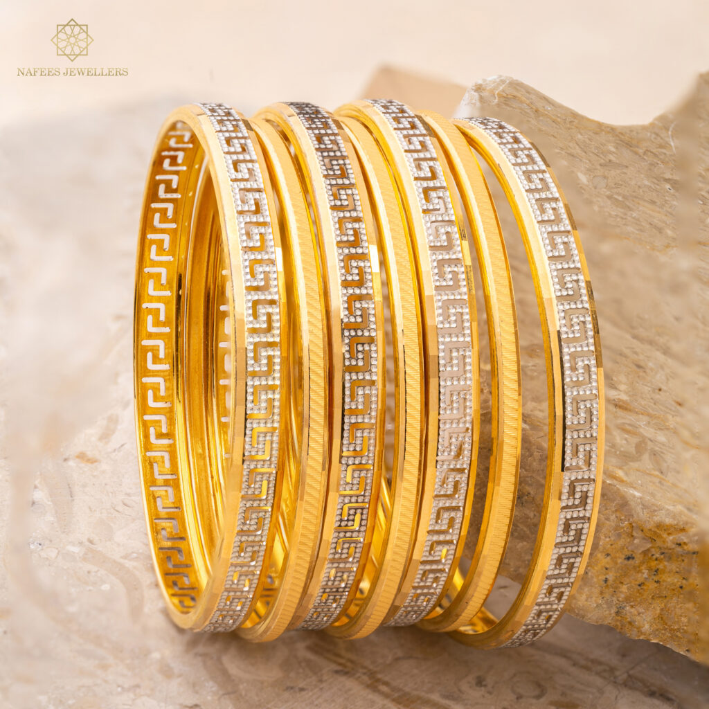 Fine gold bangle set by Hibaat