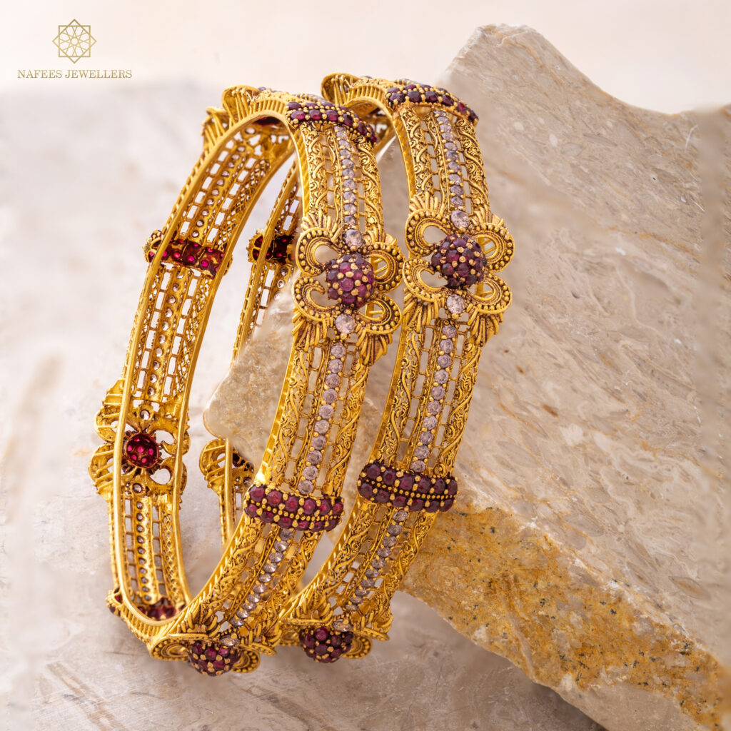 Fine gold ruby bangle set by Hibaat