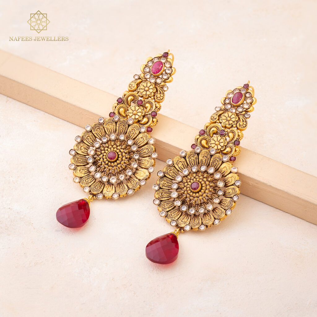 Fine gold ruby earrings by Hibaat