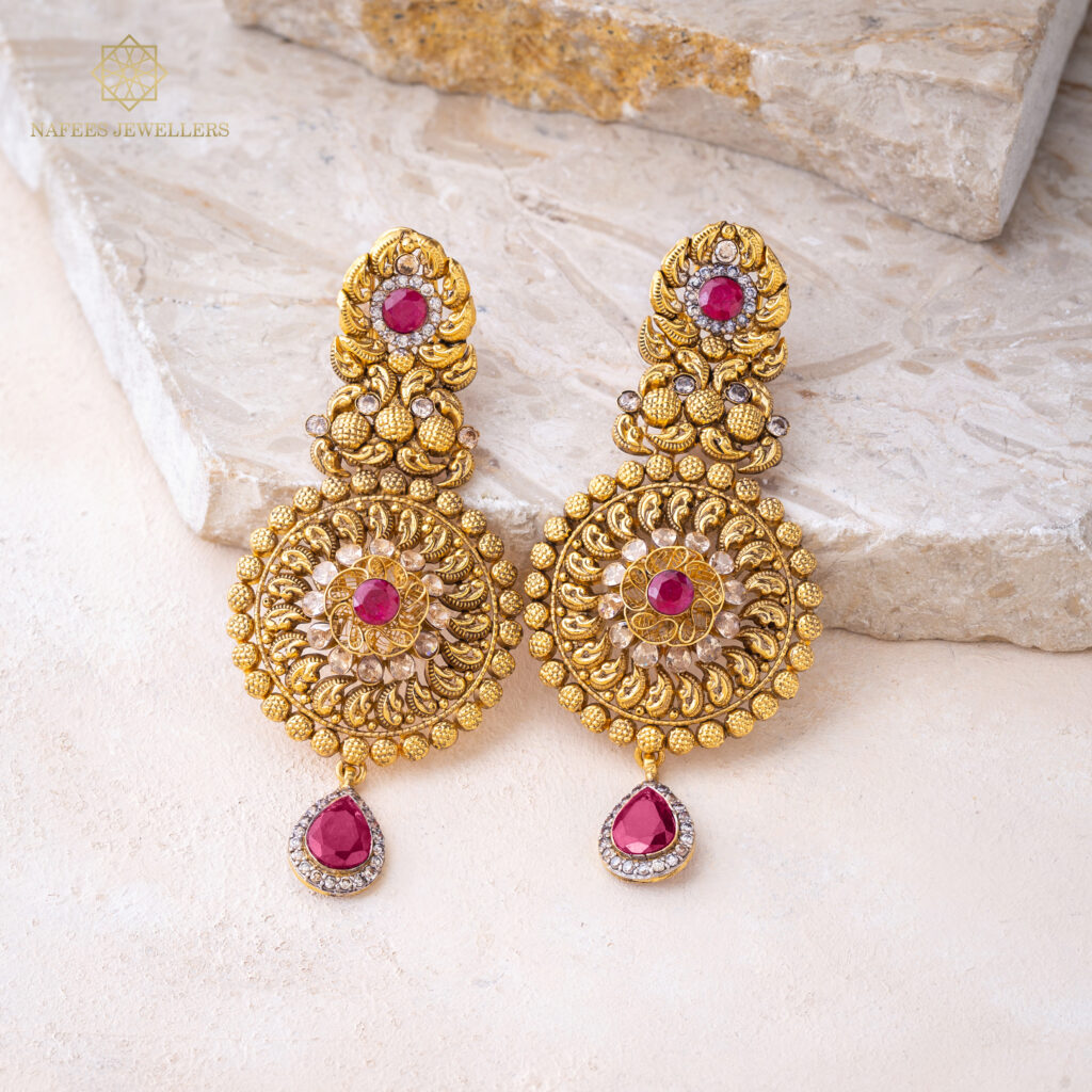 Fine gold ruby earrings by Hibaat