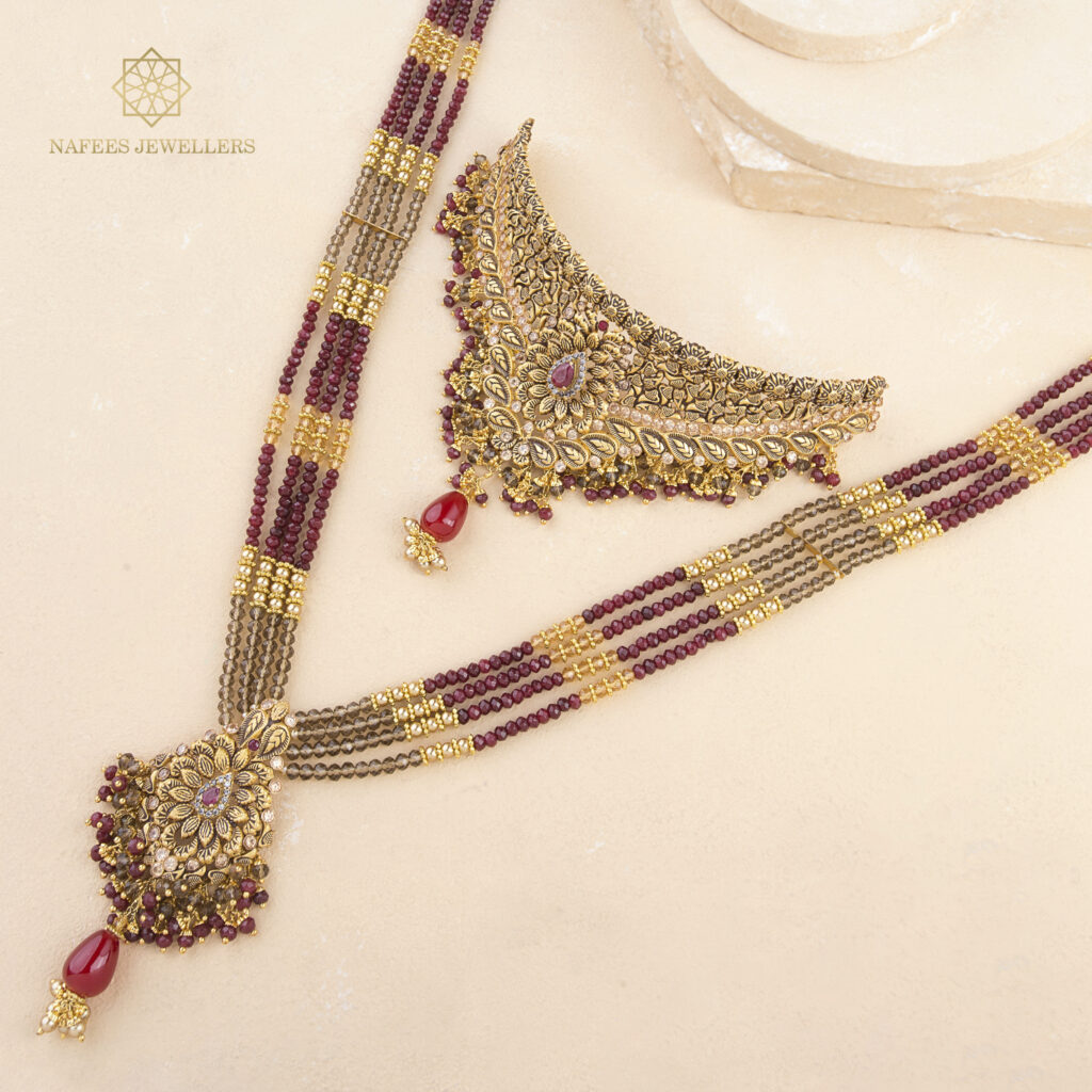 Fine gold ruby matha patti by Hibaat