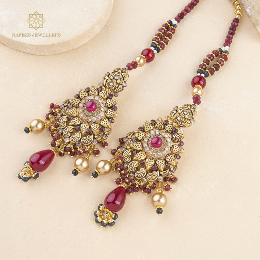 Fine gold ruby matha patti by Hibaat
