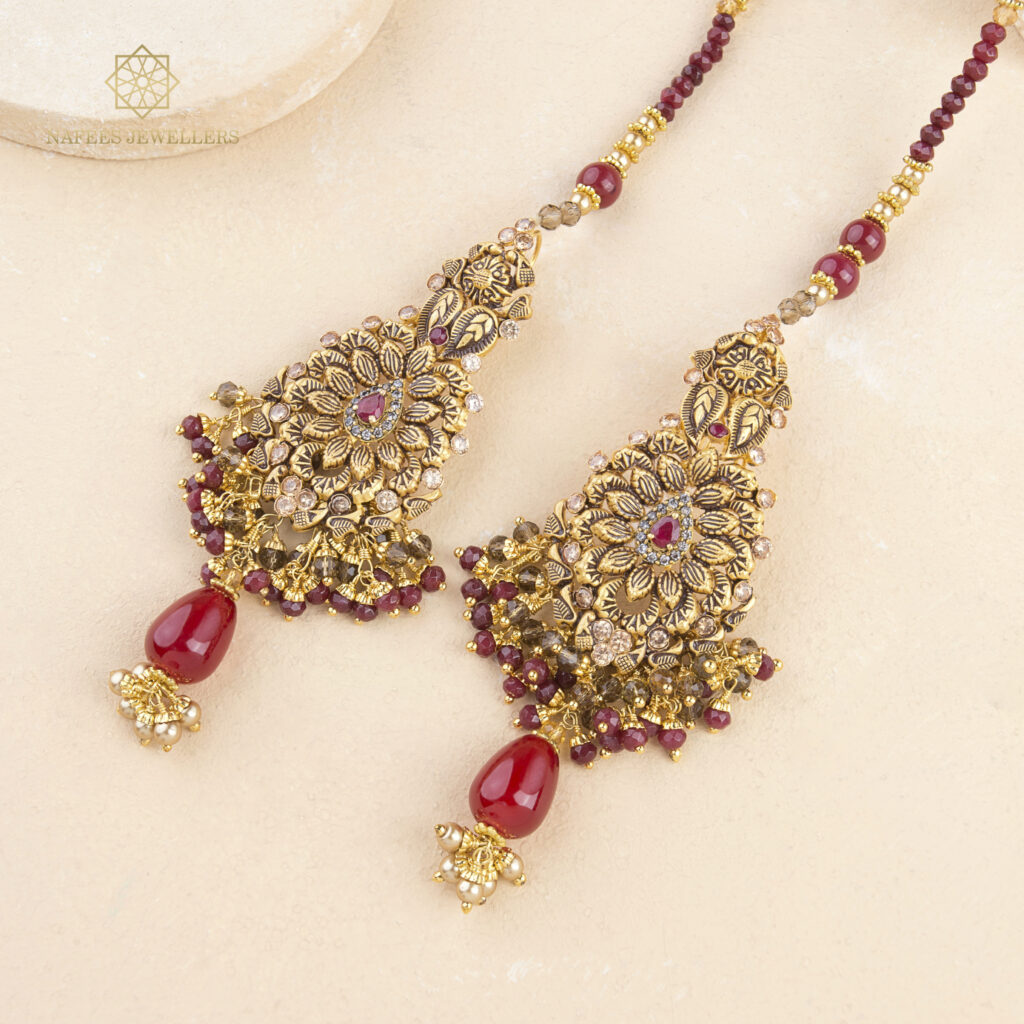 Fine gold ruby matha patti by Hibaat