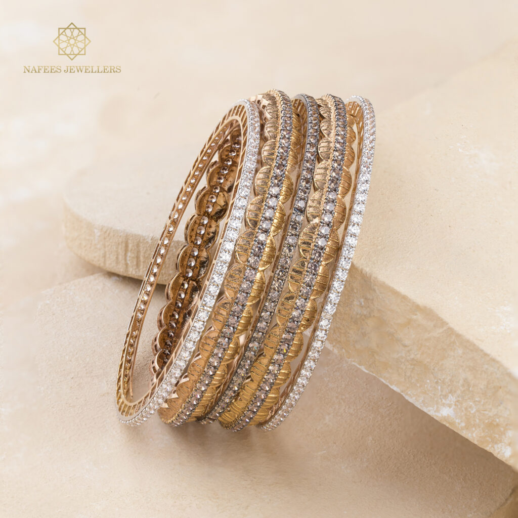 Fine gold bangle set by Hibaat