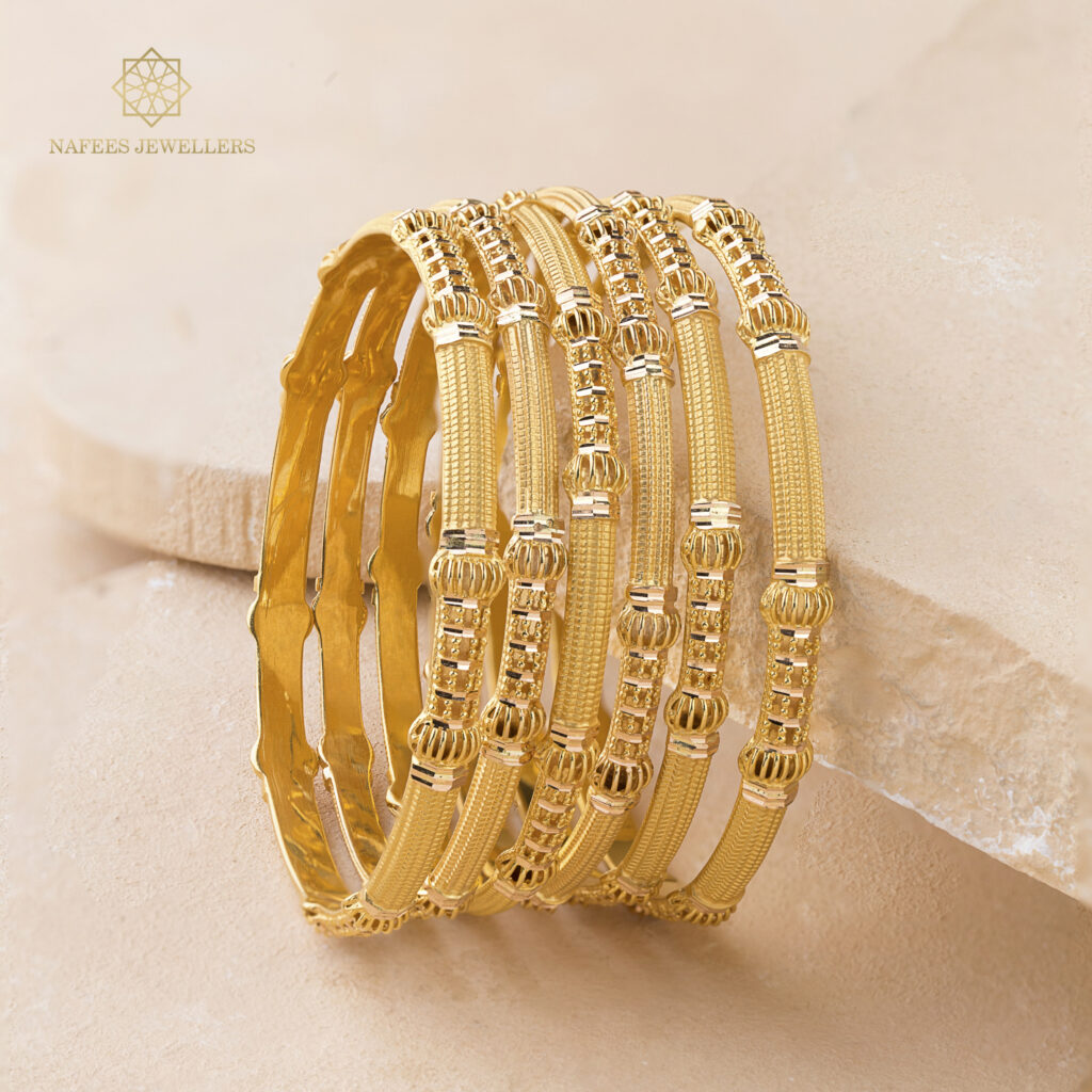 Fine gold bangle set by Hibaat