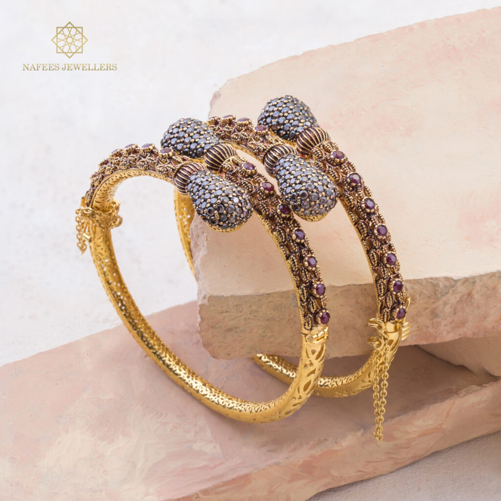 Fine gold sapphire bangle by Hibaat