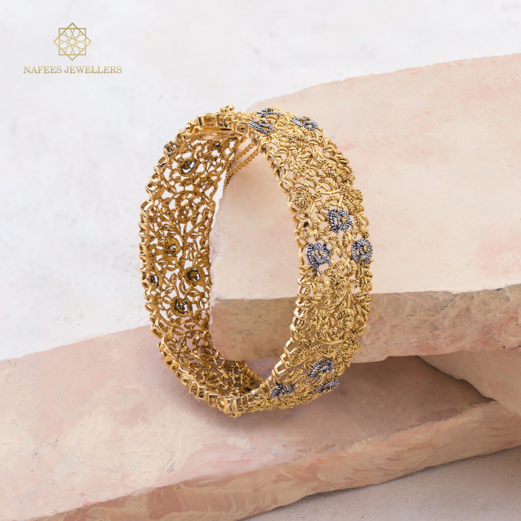 Fine gold sapphire bangle by Hibaat