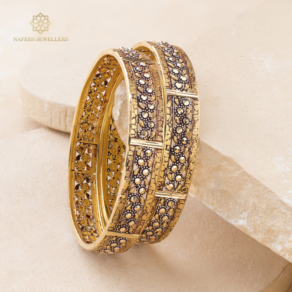Fine gold bangle set by Hibaat