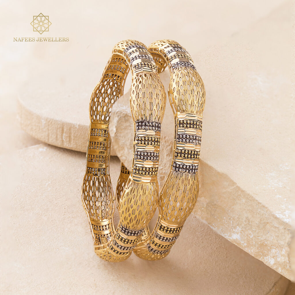 Fine gold bangle set by Hibaat